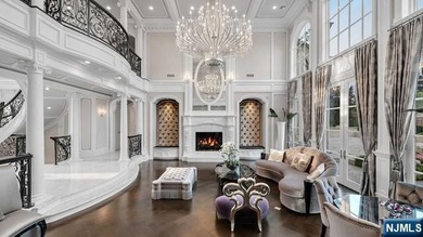 Welcome to this custom-built estate situated high atop the - photo 10