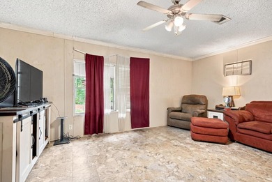 This spacious 3-bedroom, 2-bathroom home offers a bright - photo 3