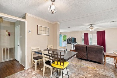 This spacious 3-bedroom, 2-bathroom home offers a bright - photo 4