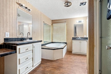 This spacious 3-bedroom, 2-bathroom home offers a bright - photo 5