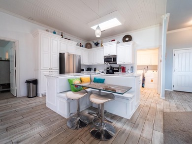 Built in 2013, this 4-bedroom, 2-bath home is one of the newer - photo 8