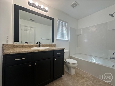 Priced to sell, this exceptional 3-bedroom, 2-bath home offers - photo 15