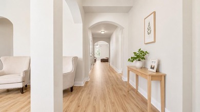 Experience luxurious pond-front living in this beautifully - photo 2