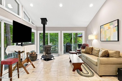 Set on two lots totaling 1.3 acres with panoramic views of the - photo 22
