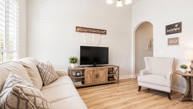 Experience luxurious pond-front living in this beautifully - photo 3