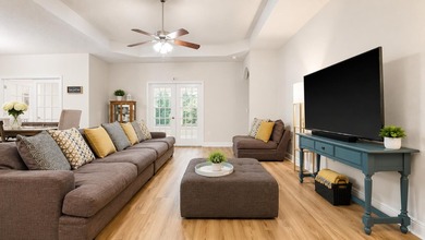 Experience luxurious pond-front living in this beautifully - photo 4