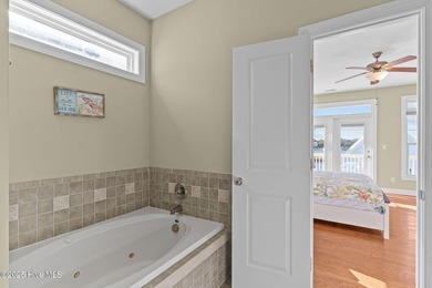 Gorgeous 5 bedroom, 4.5 bath coastal duplex just 3 houses from