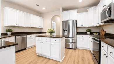 Experience luxurious pond-front living in this beautifully - photo 5