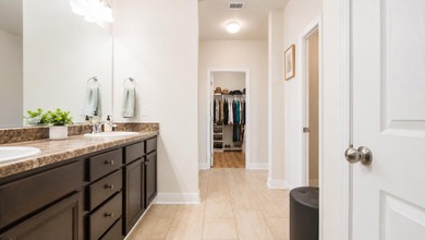 Experience luxurious pond-front living in this beautifully - photo 10