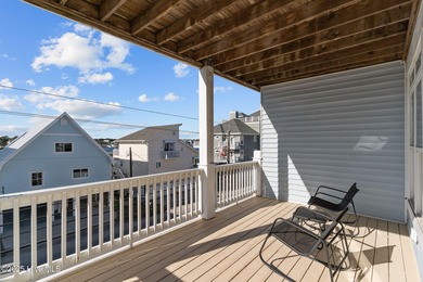 Gorgeous 5 bedroom, 4.5 bath coastal duplex just 3 houses from