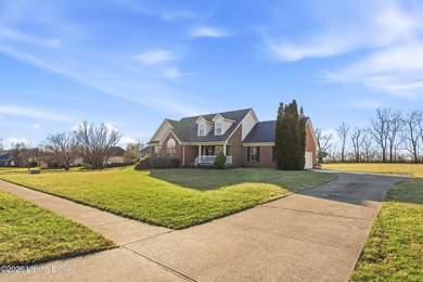 Beautiful brick ranch on a level 1 acre lot in the highly