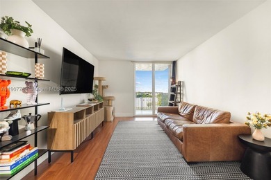 Sleek city living meets unmatched convenience in this updated - photo 1