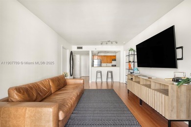 Sleek city living meets unmatched convenience in this updated - photo 2