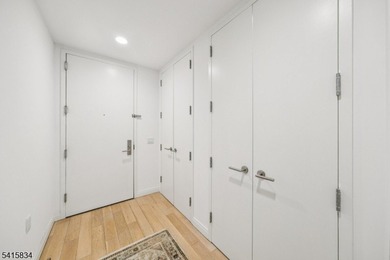 Discover sophisticated city living in this bright and spacious - photo 11