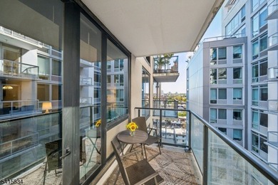 Discover sophisticated city living in this bright and spacious - photo 12