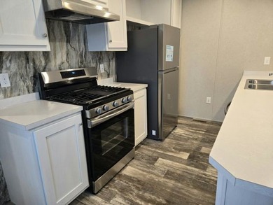 Own your own home in a quiet, well-maintained neighborhood! This - photo 3