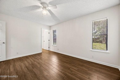 Ready for a quick move-in! This home offers tiled flooring - photo 22