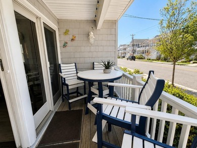 Just 1 block from the beach, this inviting first floor Ocean - photo 4