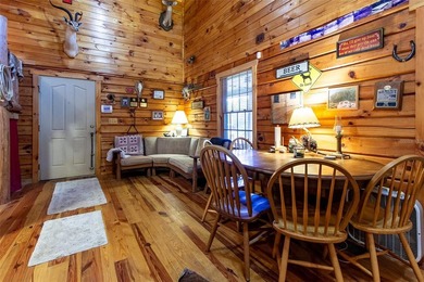 This authentic rustic log cabin retreat is tucked away at the - photo 8