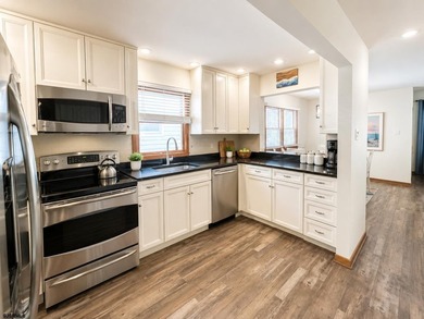 Just 1 block from the beach, this inviting first floor Ocean - photo 8