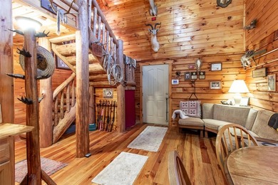 This authentic rustic log cabin retreat is tucked away at the - photo 9