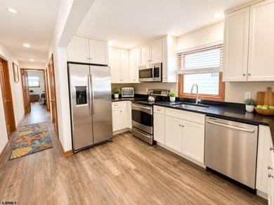 Just 1 block from the beach, this inviting first floor Ocean - photo 9
