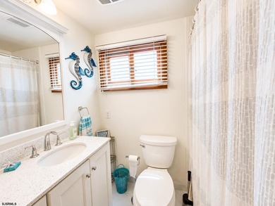 Just 1 block from the beach, this inviting first floor Ocean - photo 10