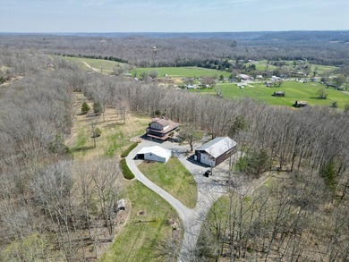 Beautiful 39+ acre farm with a spring-fed stocked pond, mature - photo 2