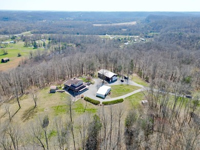 Beautiful 39+ acre farm with a spring-fed stocked pond, mature - photo 3