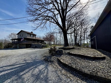 Beautiful 39+ acre farm with a spring-fed stocked pond, mature - photo 10