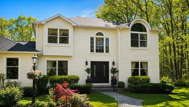 This very well-maintained home is tucked away on a quiet - photo 1