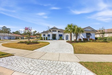 Experience refined coastal living in this custom-built 3-4 - photo 2