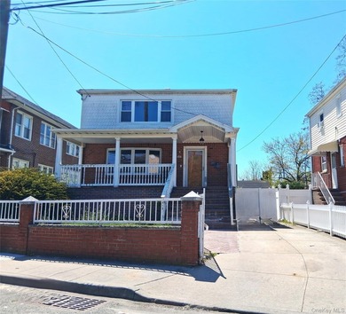 Spacious two-family home offering Two 3-bedroom, 1.5-bath units - photo 1