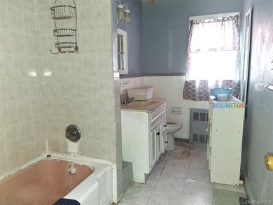 Spacious two-family home offering Two 3-bedroom, 1.5-bath units - photo 7