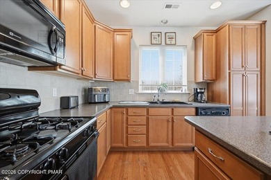 Here's a chance at acquiring a luxury townhome in the highly - photo 28