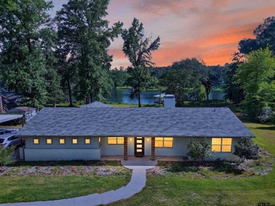 Nestled along the peaceful shores of Swan Lake, this beautifully - photo 3
