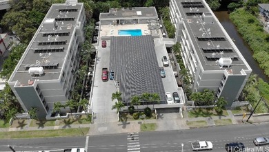 Located in the Waialae Place complex, this 2 bedroom, 1 bath - photo 1