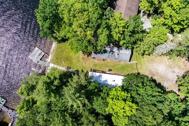 Two almost identical ranch style cottages sit on 75' of open - photo 4