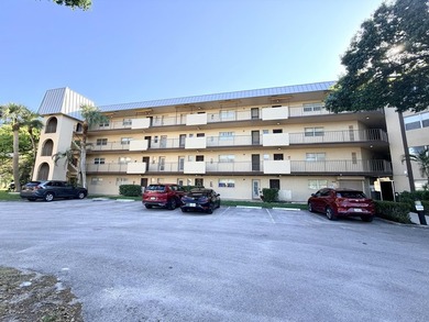 Welcome to this spacious and bright 2/2 corner unit with an - photo 1