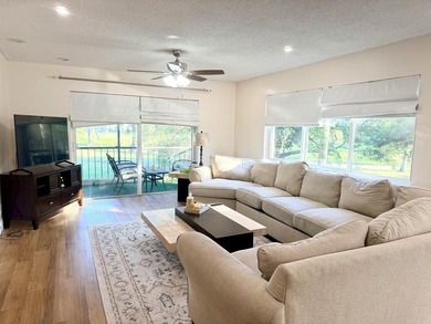 Welcome to this spacious and bright 2/2 corner unit with an - photo 8