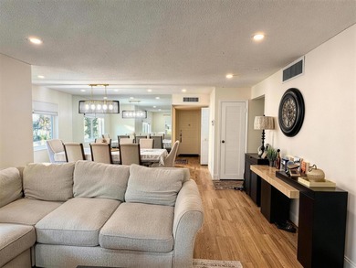 Welcome to this spacious and bright 2/2 corner unit with an - photo 9
