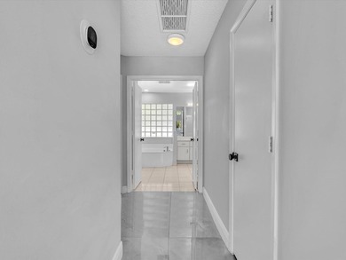 Beautifully updated waterfront pool home in the highly - photo 21