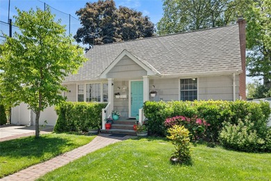 Welcome to 156 Moore Avenue! Nestled on a quiet residential - photo 1