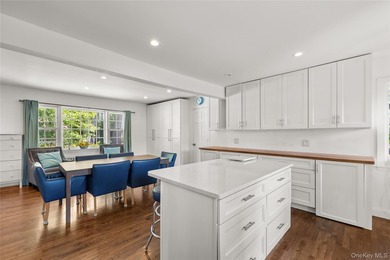 Welcome to 156 Moore Avenue! Nestled on a quiet residential - photo 3