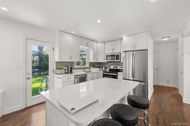 Welcome to 156 Moore Avenue! Nestled on a quiet residential - photo 4