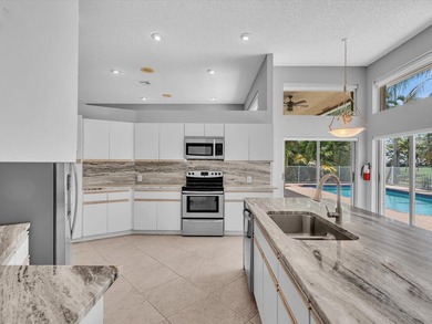 Beautifully updated waterfront pool home in the highly - photo 34