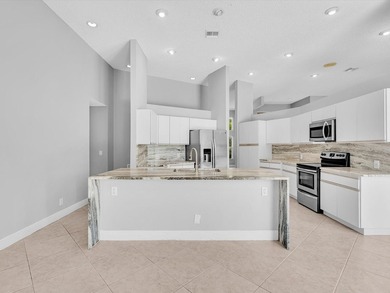 Beautifully updated waterfront pool home in the highly - photo 38