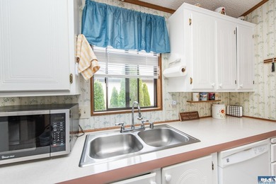 Welcome to West Alder Estates! This well-maintained 2-bedroom - photo 13