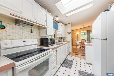 Welcome to West Alder Estates! This well-maintained 2-bedroom - photo 15