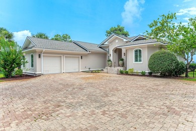 This pristine coastal retreat in Driftwood Estates is placed on - photo 3